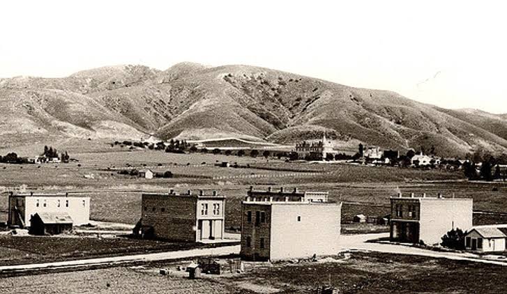Early view of the Whittier townsite with scattered homes and citrus groves